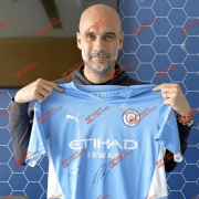 Pep-signed-jersey.png